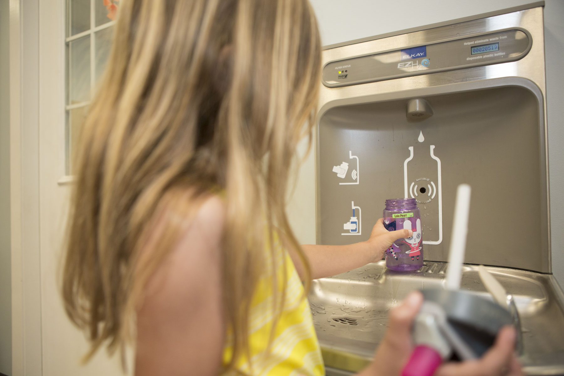 Island Prep Elementary School St Augustine, Florida -Third grade primary student refills water bottle